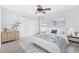 Bright bedroom featuring neutral walls, carpet, ceiling fan, and closet at 169 Winding Oaks Ln, Oviedo, FL 32765