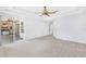 Large bedroom with tray ceiling and slider door to patio at 169 Winding Oaks Ln, Oviedo, FL 32765