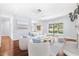 Cozy living area with sliders leading to a covered lanai and backyard at 169 Winding Oaks Ln, Oviedo, FL 32765