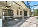 Covered patio with pool view, ceiling fans, and skylights at 169 Winding Oaks Ln, Oviedo, FL 32765