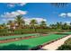 Beautifully landscaped bocce ball courts provide a relaxing outdoor activity for residents at 1855 Flora Pass Pl, Kissimmee, FL 34747