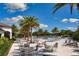 Inviting poolside patio with ample seating, perfect for relaxing and socializing by the community pool at 1855 Flora Pass Pl, Kissimmee, FL 34747