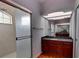 Bathroom showcasing tiled shower with glass door and granite vanity at 2300 Dawnwood Ln, Orlando, FL 32809