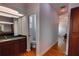 Bright bathroom featuring granite vanity with an adjacent water closet at 2300 Dawnwood Ln, Orlando, FL 32809