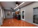 A kitchen featuring stainless steel appliances, wood cabinets, tile flooring, and modern lighting at 2300 Dawnwood Ln, Orlando, FL 32809