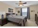 Cozy bedroom featuring a comfortable bed, bedside tables, and soft lighting, ideal for relaxation at 23520 San Sebastian Ct, Sorrento, FL 32776