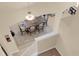 Overhead shot of dining area featuring a large wooden table with six chairs, great for Gathering meals at 23520 San Sebastian Ct, Sorrento, FL 32776