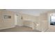 Spacious hallway with access to bedrooms and stairs, creating a central hub in the home at 23520 San Sebastian Ct, Sorrento, FL 32776