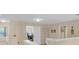 Upstairs hallway leading to various rooms, showcasing the layout and connectivity of the home at 23520 San Sebastian Ct, Sorrento, FL 32776