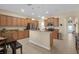 Bright kitchen featuring an island, granite countertops, and stainless steel appliances at 23520 San Sebastian Ct, Sorrento, FL 32776