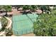 Aerial view of community tennis and basketball courts, perfect for active residents and sports enthusiasts at 23520 San Sebastian Ct, Sorrento, FL 32776