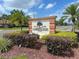 Attractive Carrington Park community sign surrounded by lush landscaping and palm trees at 2426 Branch Way # 200, Maitland, FL 32751