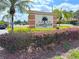 Carrington Park community entrance sign with lush landscaping, creating a welcoming environment at 2426 Branch Way # 200, Maitland, FL 32751