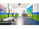 Entertaining game room includes a ping pong table, air hockey table and colorful Mario themed decor at 2791 Punctuation Pl, Kissimmee, FL 34746