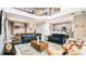 Spacious living and dining area, featuring modern decor, comfortable seating, and an open-concept design at 2791 Punctuation Pl, Kissimmee, FL 34746