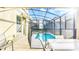 Outdoor view of the swimming pool area with a safety fence around it at 2791 Punctuation Pl, Kissimmee, FL 34746