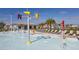 Community splash pad featuring colorful buckets, playful water features, and inviting lounge chairs at 2791 Punctuation Pl, Kissimmee, FL 34746