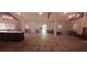 Large event space with wood flooring and decorative lighting at 2810 N Powers Dr # 59, Orlando, FL 32818