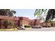 Exterior view of well-maintained condo buildings and convenient parking at 2810 N Powers Dr # 59, Orlando, FL 32818
