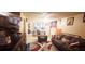 Cozy living room with tile floors and a view of the kitchen at 2810 N Powers Dr # 59, Orlando, FL 32818