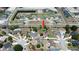 Aerial view of a residential neighborhood with single-Gathering homes, manicured lawns, and mature trees at 2850 Babylon Ct, Oviedo, FL 32765