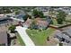 Aerial view of a single-Gathering home with a well-manicured lawn, mature trees, and a screened-in pool at 2850 Babylon Ct, Oviedo, FL 32765