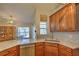 Beautiful kitchen featuring granite countertops, stainless steel appliances, and custom cabinetry at 2850 Babylon Ct, Oviedo, FL 32765