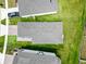 Aerial view of a home's roof and backyard at 30498 Pintail Dr, Leesburg, FL 34748