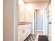 Bathroom featuring a vanity with granite countertops and a glass shower at 30498 Pintail Dr, Leesburg, FL 34748