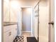 Bathroom featuring a modern glass shower and neutral tile flooring at 30498 Pintail Dr, Leesburg, FL 34748