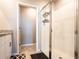 Bathroom showcasing glass-enclosed shower and neutral design elements at 30498 Pintail Dr, Leesburg, FL 34748