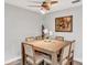 Dining room features a large wooden table with seating for six at 311 Needles Trl, Longwood, FL 32779