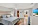 Spacious main bedroom with hardwood floors and ensuite bathroom at 311 Needles Trl, Longwood, FL 32779