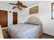Comfortable bedroom featuring a ceiling fan and closet at 3131 Juniper Dr, Edgewater, FL 32141