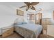 Comfortable bedroom featuring a ceiling fan and closet at 3131 Juniper Dr, Edgewater, FL 32141