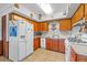 Kitchen featuring wood cabinets, and appliances at 3131 Juniper Dr, Edgewater, FL 32141