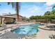 Sparkling pool and spa with inviting outdoor living space at 3131 Juniper Dr, Edgewater, FL 32141