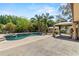 Relaxing backyard featuring a private pool and entertainment space at 3131 Juniper Dr, Edgewater, FL 32141