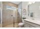 Elegant bathroom featuring a glass-enclosed shower, a modern vanity, and stylish fixtures at 3397 Sagebrush St, Harmony, FL 34773