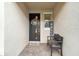 Inviting front entrance with a bench, a welcoming wreath, and stylish brick pavers at 3397 Sagebrush St, Harmony, FL 34773