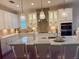 Modern kitchen showcases stainless steel appliances, pendant lighting, and a spacious island at 3397 Sagebrush St, Harmony, FL 34773