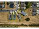 Overhead view of several homes with swimming pools and well-maintained yards in a residential neighborhood at 344 Cadiz Loop, Davenport, FL 33837