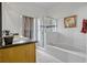 Bathroom featuring a bathtub, separate shower, and a single vanity at 344 Cadiz Loop, Davenport, FL 33837