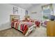 A vibrant ' bedroom featuring two twin beds, light walls, and carpeted floors at 344 Cadiz Loop, Davenport, FL 33837