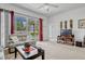 Bright living room with a sliding door offering a view of the pool at 344 Cadiz Loop, Davenport, FL 33837