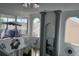 Elegant interior with soaring ceilings, arched windows, and an ornate chandelier at 3772 Huntwicke Blvd, Davenport, FL 33837