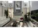 Bright and airy living room with high ceilings, large windows, and stylish decor at 3772 Huntwicke Blvd, Davenport, FL 33837