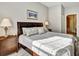 Inviting bedroom with a comfortable bed, stylish linens, and abundant natural light at 4560 Spigold Court, Kissimmee, FL 34746
