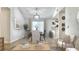 Cozy dining room area with modern light fixture, adjacent to a stylish, updated kitchen space at 5284 Indian Laurel Ct, Orlando, FL 32808