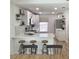 Bright and modern kitchen with quartz countertops and stainless steel appliances at 5284 Indian Laurel Ct, Orlando, FL 32808